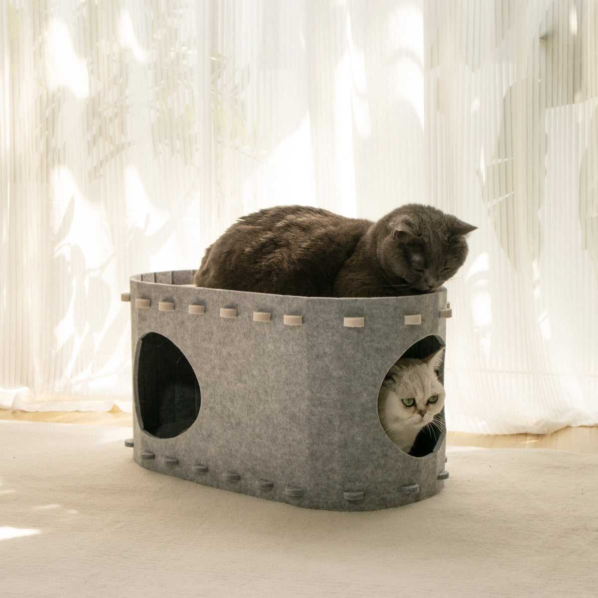 Cozy cat cave made of felt.
