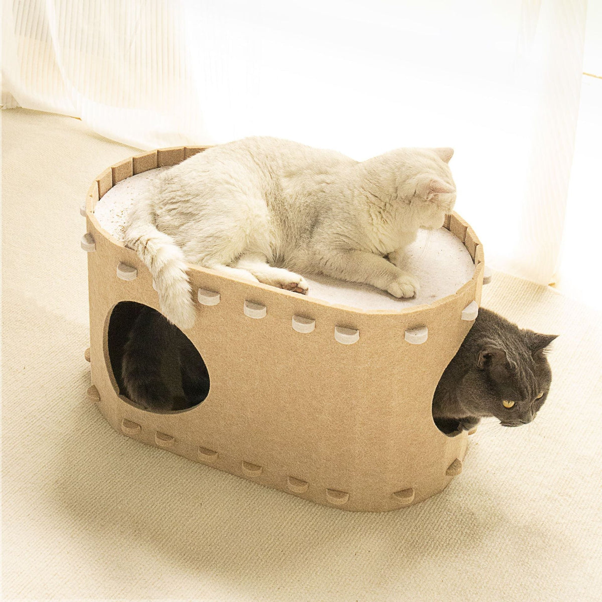 Cozy cat cave made of felt.